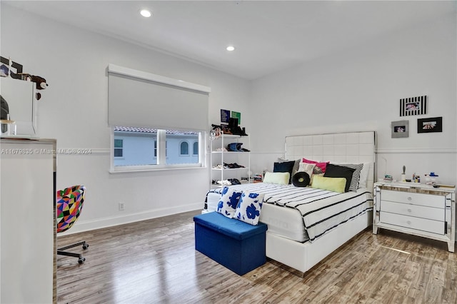 bedroom featuring hardwood / wood-style floors