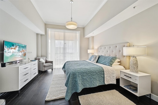 bedroom featuring ornamental molding and dark hardwood / wood-style floors