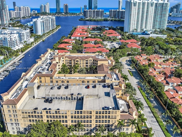 drone / aerial view featuring a water view