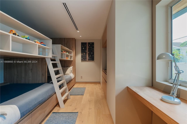 bedroom with light wood-type flooring