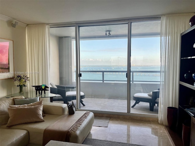 living room featuring a water view