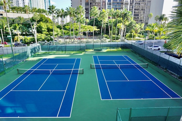 view of sport court featuring basketball hoop