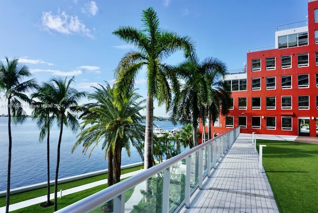 balcony featuring a water view