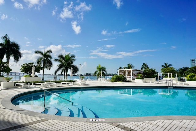 view of swimming pool with a patio area