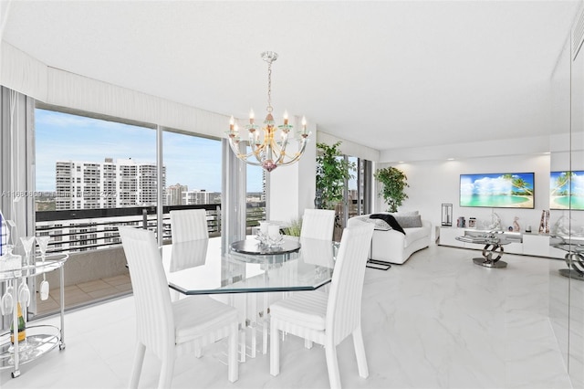 dining space with an inviting chandelier