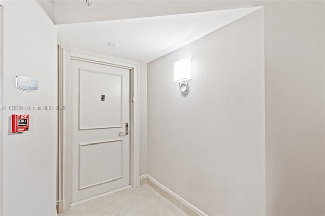 doorway featuring light tile patterned floors