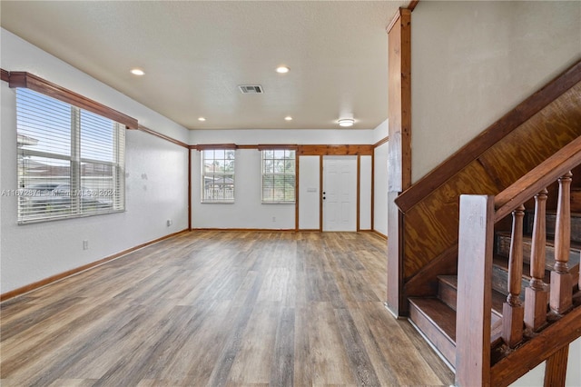 entrance foyer featuring hardwood / wood-style flooring