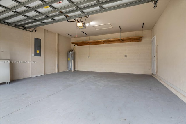 garage featuring a garage door opener, electric panel, and water heater