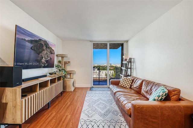 850 N Miami Ave Unit W-906, Miami, FL 33136 - living room with wood finished floors and a wall of windows