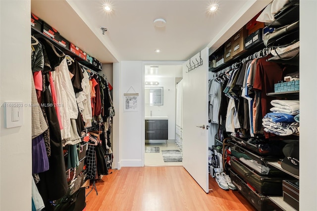 850 N Miami Ave Unit W-906, Miami, FL 33136 - walk in closet featuring wood finished floors