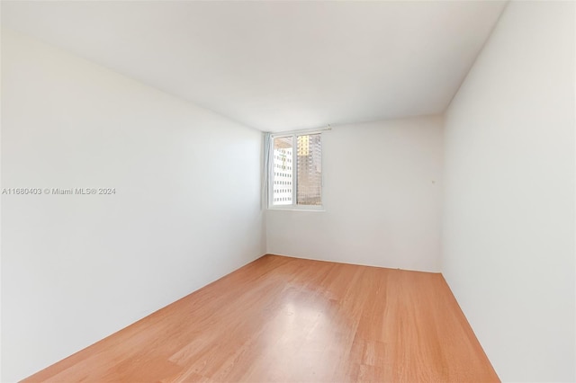 850 N Miami Ave Unit W-906, Miami, FL 33136 - spare room featuring light wood-style flooring