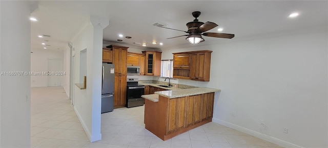 kitchen featuring ceiling fan, sink, kitchen peninsula, crown molding, and appliances with stainless steel finishes