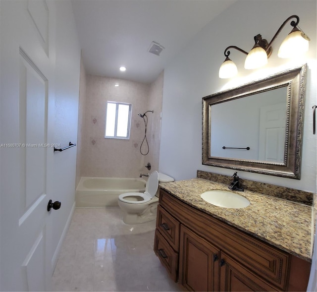 full bathroom featuring vanity, toilet, and tiled shower / bath