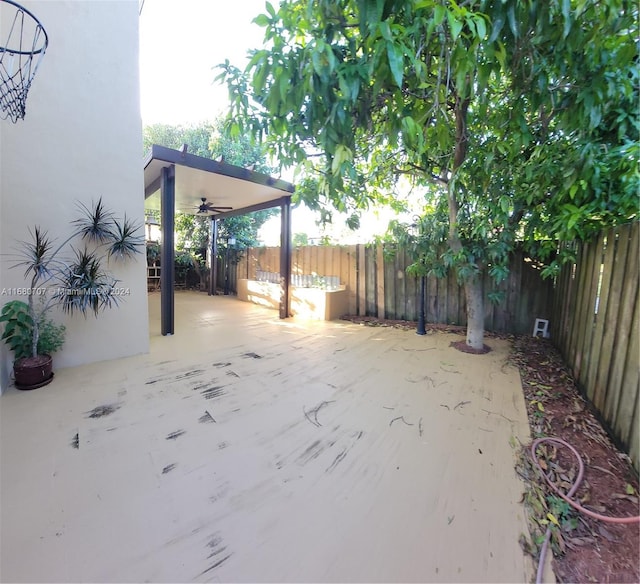 view of patio with ceiling fan