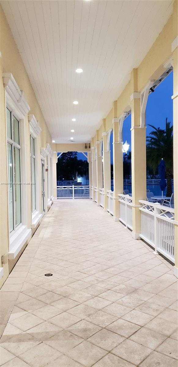 corridor featuring wood ceiling