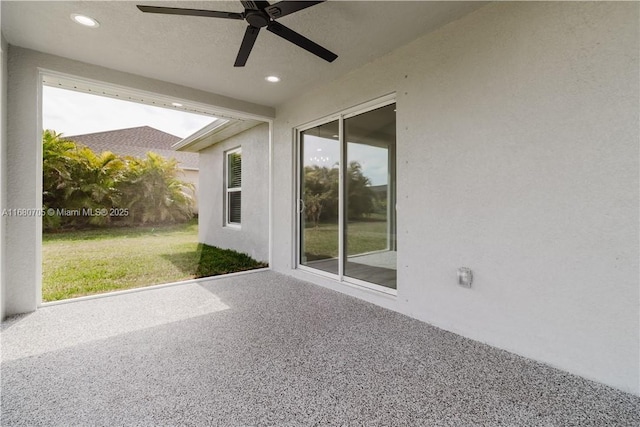 view of patio / terrace featuring a ceiling fan