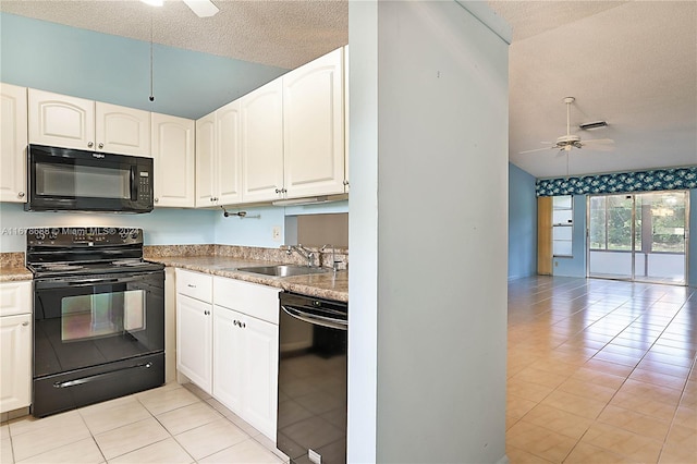 kitchen with sink, black appliances, white cabinets, a textured ceiling, and ceiling fan