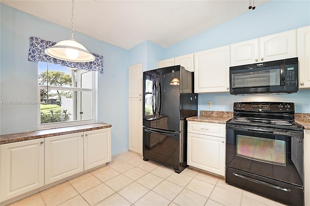 kitchen with black appliances, decorative light fixtures, light tile patterned floors, white cabinetry, and a textured ceiling