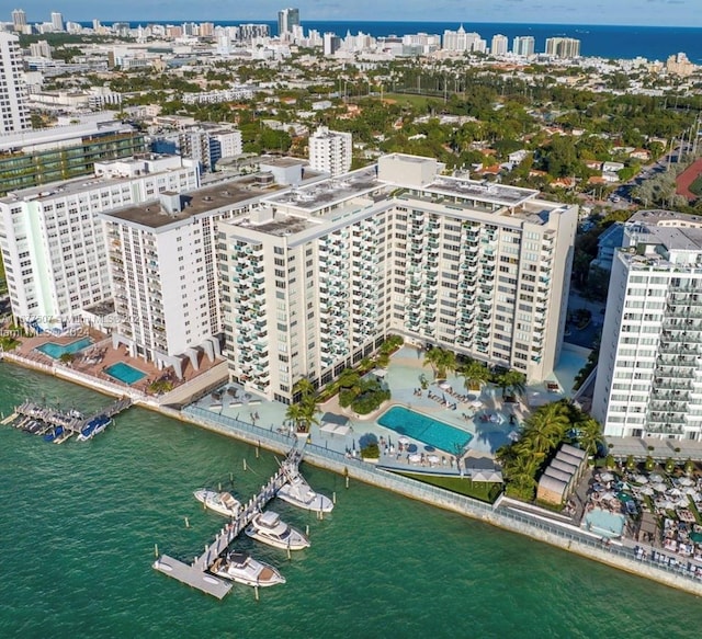 birds eye view of property featuring a water view