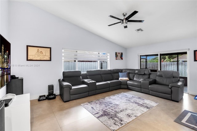 living room with ceiling fan, light tile patterned flooring, and high vaulted ceiling