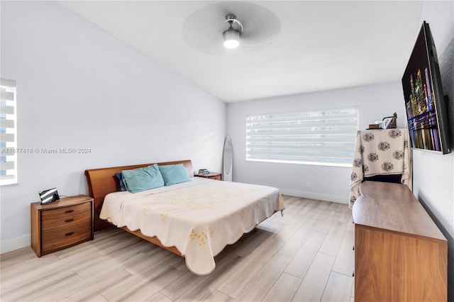 bedroom with light hardwood / wood-style floors