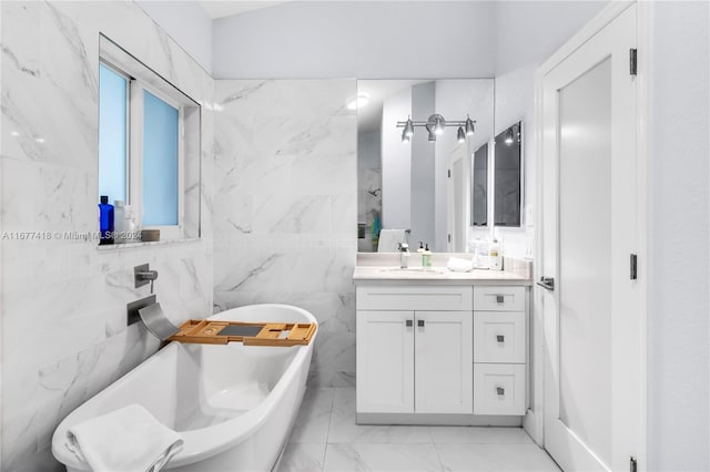 bathroom featuring a tub and vanity