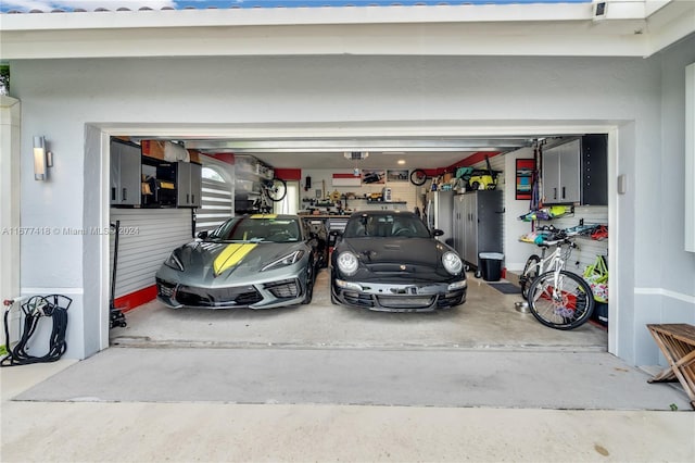 garage featuring a garage door opener