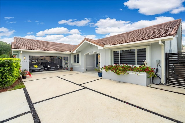 view of front of home with a garage