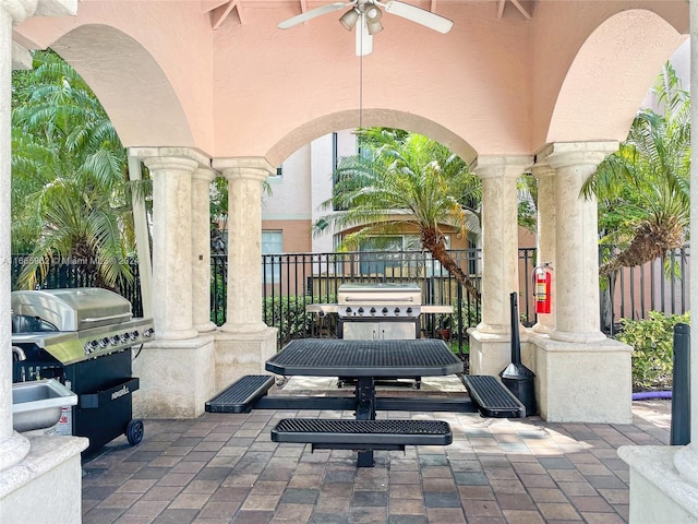 view of patio / terrace with area for grilling and ceiling fan