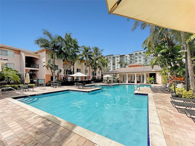 view of swimming pool featuring a patio