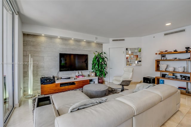 living room featuring light tile patterned floors