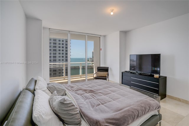 bedroom with a wall of windows