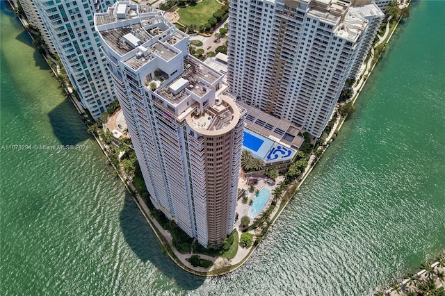 birds eye view of property featuring a water view