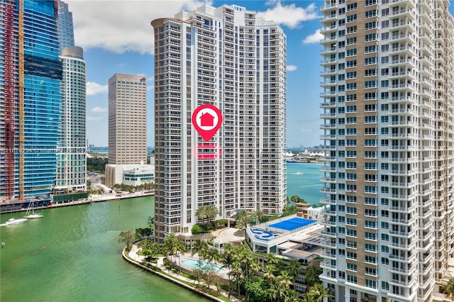 property's view of city featuring a water view