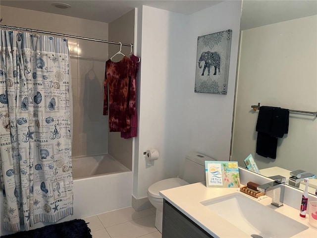 full bathroom featuring toilet, vanity, tile patterned floors, and shower / tub combo