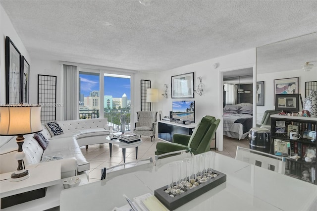 tiled living room with a textured ceiling