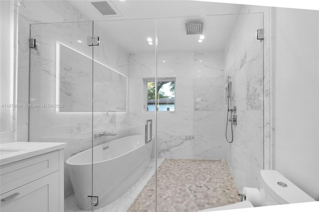 full bathroom featuring vanity, independent shower and bath, tile walls, and toilet