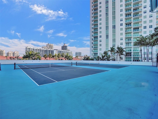 view of tennis court with basketball court