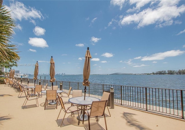 view of patio featuring a water view