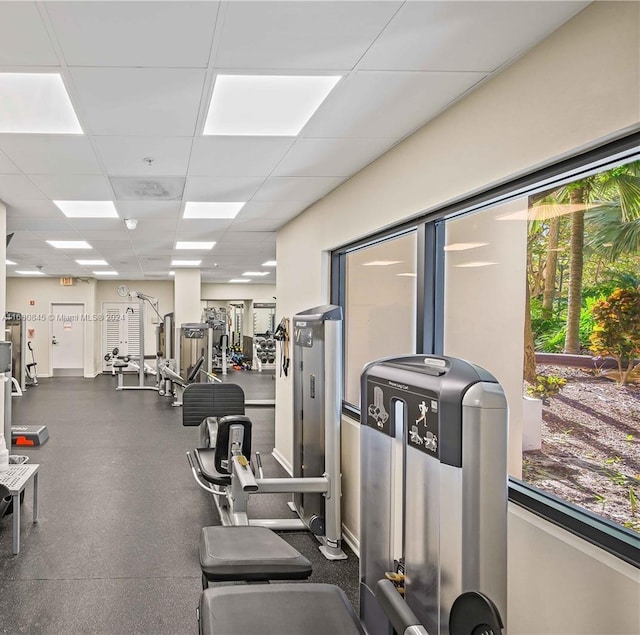 exercise room with a drop ceiling