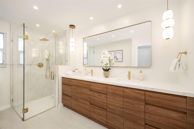 bathroom with vanity, tile patterned flooring, and walk in shower