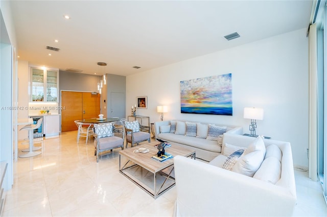 living room with beverage cooler