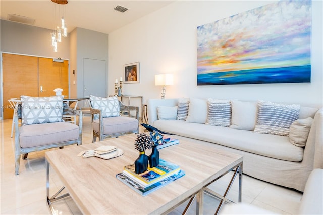 living room with light tile patterned floors