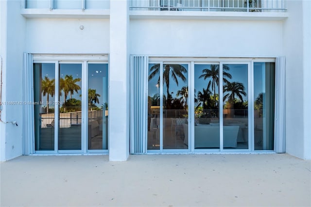 doorway to property featuring a patio area