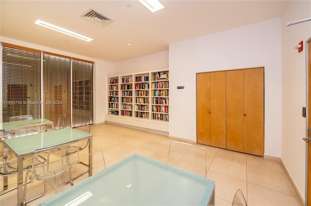 interior space with light tile patterned floors