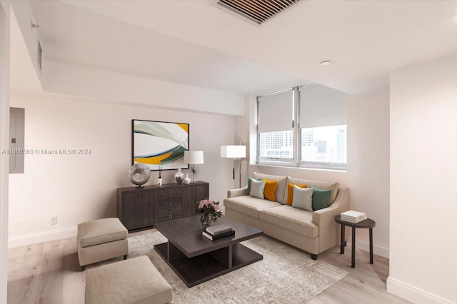 living room with light hardwood / wood-style flooring