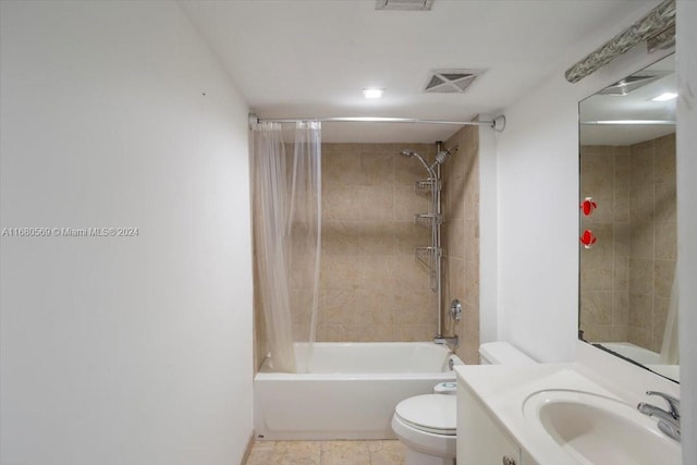 full bathroom featuring toilet, shower / bath combination with curtain, vanity, and tile patterned floors