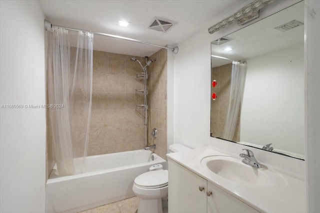 full bathroom featuring toilet, shower / bath combo, vanity, and tile patterned floors