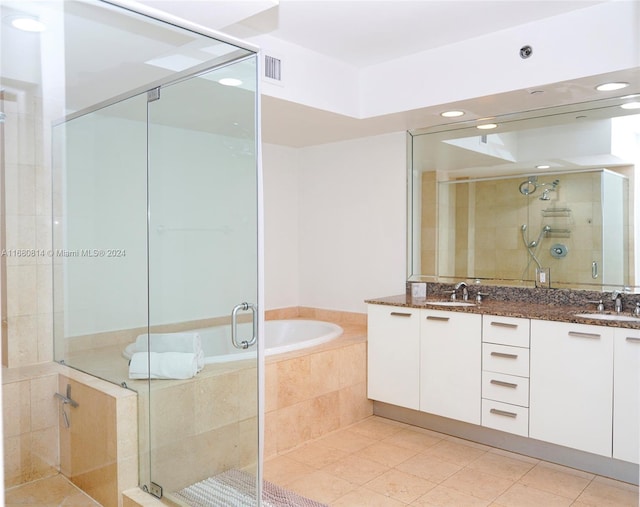 bathroom with vanity, separate shower and tub, and tile patterned flooring