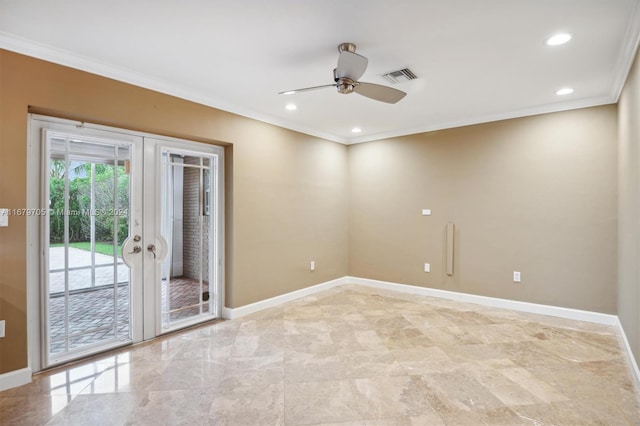 spare room featuring french doors, crown molding, and ceiling fan